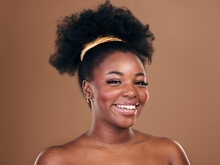 Image showing Portrait, natural hair care or happy black woman with afro, self love or smile on a brown studio background. Hairstyle, healthy growth or African model with glow or beauty with aesthetic or wellness