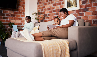 Image showing Relax, happy and tablet with black family on sofa for technology, learning and social media. Streaming, website and smile with parents and child in living room of home for watching movies and cartoon