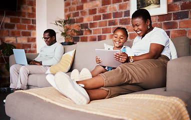 Image showing Relax, smile and tablet with black family on sofa for technology, learning and social media. Streaming, website and happy with parents and child in living room of home for watching movies and cartoon