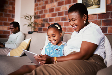 Image showing Happy, learning and a mother with a tablet and a child for a cartoon, movies or games on the sofa. Smile, reading and an African family, mom or girl kid with technology for social media in a house