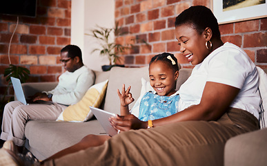 Image showing Ok, learning and a mother with a tablet and a child for a cartoon, movies or games on the sofa. Smile, perfect and an African family, mom or girl kid with technology for social media in a house