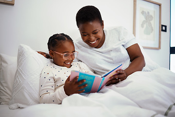 Image showing Relax, storytelling and book with mother and daughter in bedroom for education, fantasy and bedtime. Happy, learning and reading with woman and child in bed of black family home for knowledge