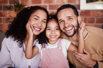 Image showing Portrait, happy and family with a smile on a home sofa for fun, bonding and time together. Face of a young man, woman and girl kid in a lounge with love, care and happiness in a house in Puerto Rico