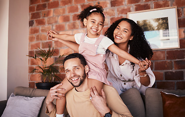 Image showing Family, happy and playing airplane on a home sofa for fun, freedom and time together. Portrait of a man, woman and girl kid in a lounge with love, care or happiness for game in a house in Puerto Rico