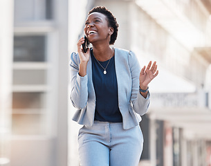 Image showing Business, walking and phone call of happy woman in city for conversation, mobile networking and funny communication. African worker talking on smartphone for contact, chat and laugh in urban street