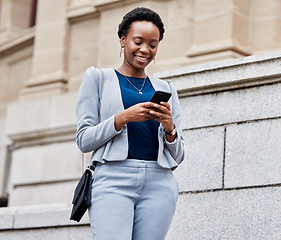 Image showing Business, city or black woman with a smartphone, typing or connection with consultant, smile or communication. Person, entrepreneur or cellphone with mobile app, email or outdoor with internet search