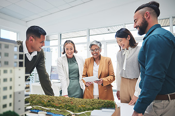 Image showing Creative people, real estate and designers in meeting with 3D model, building project or startup at office. Happy engineering team in architecture brainstorming, strategy or design idea at workplace