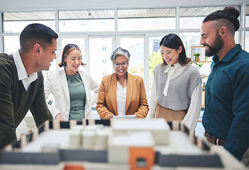 Image showing Creative people, real estate and design team in meeting with 3D model, building project or startup at office. Happy group in teamwork, architecture or brainstorming strategy and planning at workplace