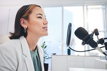 Image showing Woman, radio presenter and speech on microphone, thinking and ideas for financial advice on air. Podcast host, recording and business talk show with sound, tech and info on live streaming in studio