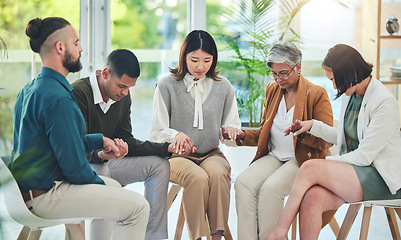 Image showing Business people, holding hands and circle with prayer, together or faith for worship, gratitude or support for praise, Men, women and sitting for meditation, mindfulness or religion for mental health