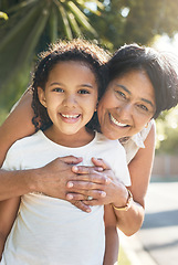 Image showing Portrait, kid or happy grandmother hug outdoor for bonding with love, support or care in retirement. Face, girl child or mature grandma with smile, peace or trust on family holiday vacation to relax