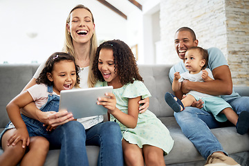 Image showing Tablet, laughing and family watching a video or funny, comedy or comic movie together in the living room. Happy, bonding and children streaming a show on digital technology with their parents at home