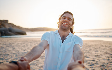 Image showing Man, holding hands and beach with pov, smile and excited for love, romance and freedom in sunset by ocean. Couple, together and comic laugh on sand, sea and waves for vacation, holiday or honeymoon