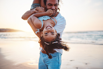 Image showing Beach, portrait and father play with girl on holiday, vacation and adventure at sunset. Happy family, summer and child laughing with dad by ocean for bonding, healthy relationship and fun outdoors