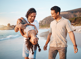 Image showing Beach, lgbtq and parents play with girl in summer on holiday, vacation and adventure. Happy family, healthy relationship and child with gay fathers by ocean for bonding, relax and fun outdoors