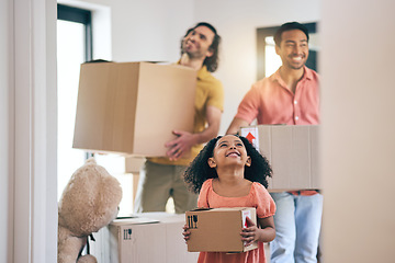 Image showing Happy, family and moving box with kid and gay parents in new home with cardboard package. Smile, child and lgbt people together with real estate and property mortgage in a house helping father