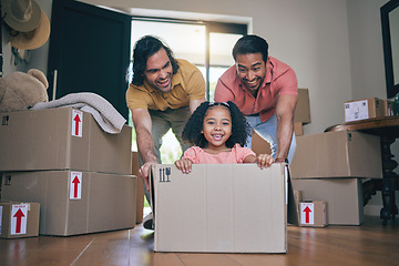 Image showing Happy, family fun and box moving with child and gay parents in new home with cardboard package. Dad smile, kid and lgbt people together with youth game and property love in a house helping father