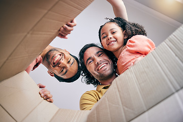 Image showing Family, open box and moving from below, portrait and smile in new house with gay father, girl kid and excited. LGBTQ men, cardboard package and happy with female child for start, life and property