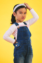 Image showing Confused, doubt and kid thinking in studio isolated on yellow background. Question, idea or girl child trying to remember memory, solution or choice, decision or why, brainstorming or problem solving