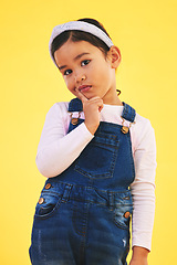 Image showing Thinking, portrait and girl child in studio with choice, decision or ask sign on yellow background. Why, face and kid with questions, solution or planning, brainstorming or confused, doubt or idea