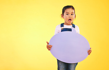 Image showing Girl kid, thinking and speech bubble in studio with wow, news and mockup space by yellow background. Young female child, poster or sign for promotion, review and opinion with vote for social media