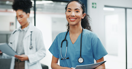 Image showing Proud face of woman doctor in busy hospital for healthcare services, leadership and happy career mindset. Confident portrait of young medical professional or female nurse in clinic or health care job