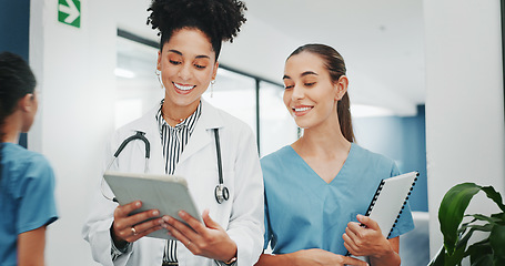 Image showing Women doctors, talking or walking in hospital in teamwork, nurse collaboration or surgery research. Smile, happy or healthcare workers in planning, communication or discussion for medicine treatment