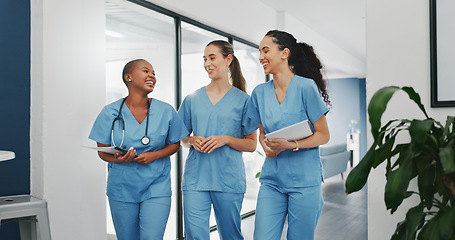 Image showing Talking nurses, walking and documents in hospital teamwork, diversity collaboration or bonding on surgery or clinic break. Smile, happy and healthcare women with medical research, paper or funny joke