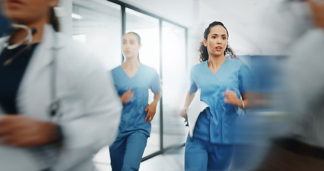 Image showing Doctors, nurses or running in hospital emergency, patient crisis or pager call in ICU stress, trauma fail or diversity clinic. Healthcare women, rushing or run in medical hallway to code blue problem