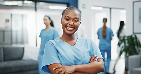 Image showing Nurse, face or arms crossed in busy hospital for about us, medical life insurance or wellness support. Smile, happy or healthcare black woman in portrait, confidence trust or help medicine internship