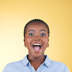 Image showing Surprise, wow or face of excited black woman on yellow background with smile for discount deal in studio. Happy, portrait or excited person shocked by sale offer, success or winning lottery jackpot