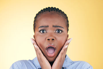 Image showing Black woman, face and alarm, shock and emoji with facial expression, drama and surprise isolated on yellow background. Wow, fear and portrait, reaction to announcement or news with anxiety in studio
