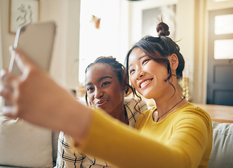 Image showing Social media, friends and selfie with women in living room for happy, relax and diversity. Smile, happiness and profile picture with people on sofa at home for content creator and influencer together