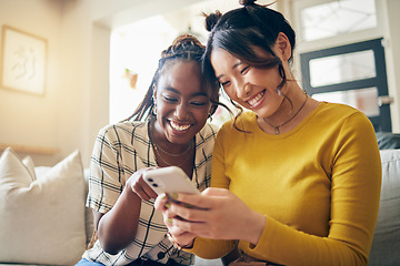 Image showing Young women, funny meme and smartphone, friends relax at home with social media and communication. Gen z, happiness and comedy online, chat and using phone with people on couch, mobile app and tech