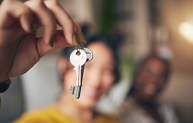 Image showing Keys, hand and new home or people moving in together for real estate investment. Rent, mortgage and loan as homeowner celebrate at apartment, property or house with a partner for freedom or security