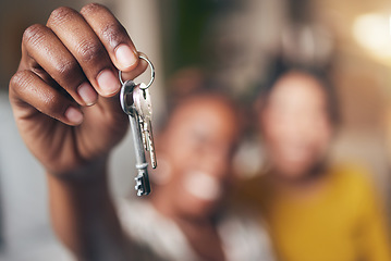 Image showing New home, hand and keys with people moving in together for real estate investment. Rent, mortgage and loan as homeowner celebrate at apartment, property or house with partner for freedom or security