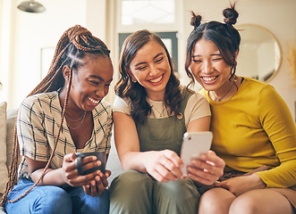 Image showing Happy, women with funny meme and smartphone, friends relax at home with social media and communication. Gen z, happiness and comedy online, chat and using phone with people on couch, app and tech