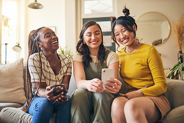 Image showing Young women, funny chat and smartphone, friends relax at home with social media and communication. Gen z, happiness and comedy online, meme and using phone with people on couch, mobile app and tech