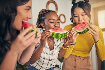 Image showing Women, friends and eating watermelon in home for bonding, nutrition and happy lunch together. Healthy diet fruit, sharing and wellness, fresh summer food for friendship and girls in kitchen at party.