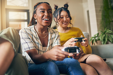 Image showing Friends, women and gaming on tv in home living room on sofa, smile and having fun online. Television, girls and play video game on couch, esports competition and bonding to relax in house together