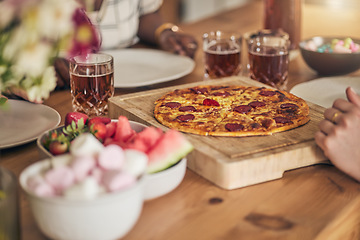 Image showing Food, drink and pizza, people have lunch and wooden table with snacks and nutrition, eating and wellness. Italian cuisine, fruit and sweets with social gathering, meal together and hungry with party