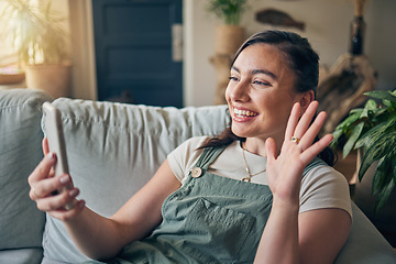 Image showing Phone, wave and woman on video call in home, communication and conversation on sofa. Smartphone, hello and happy person in webinar, virtual chat and online meeting, welcome and greeting in house.