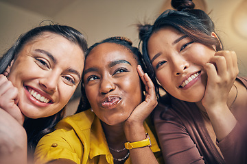 Image showing Selfie, friends and women happy, relax and bond in a living room at home together on the weekend. Portrait, smile and people with diversity pose for profile picture, blog or social media memory post