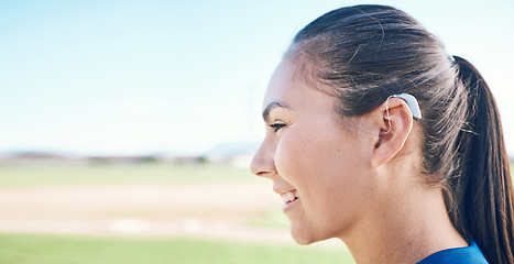 Image showing Smile, profile and woman in hearing aid, ear and sound amplifier in mockup space at park outdoor. Happy, person with a disability and deaf tools in audio communication, tech and listening microphone