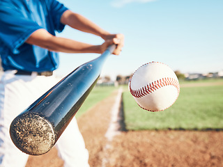 Image showing Baseball, hit and person on field for in closeup training, sports and fitness in outdoor competition. Hands, ball and bat softball player with power strike at stadium for action, speed or performance