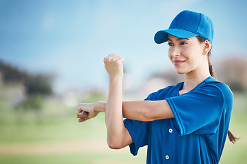 Image showing Baseball, fitness and woman stretching, game and training in uniform, exercise and health. Person, softball player and athlete stretch arms, competition and warm up for match with wellness and sports