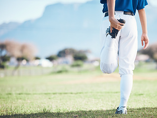 Image showing Back, baseball and athlete stretching legs at field outdoor in healthy body exercise. Warm up, hands and person prepare in sports training, wellness workout and fitness to start softball mockup space