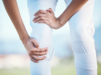 Image showing Injury, sports person or knee pain from running problem, baseball player mistake or fitness burnout risk. Bad joint, orthopedic or closeup athlete legs with match accident, strain or first aid crisis