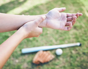 Image showing Above, field and hand pain from baseball, sports and training for a competition with an injury. Fitness, burnout and a person or athlete with a muscle accident or arm strain after a softball match