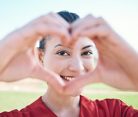 Image showing Portrait, hands and woman with heart sign, support and like with emoji, social media and icon. Face, person and girl with symbol for love, shape and outdoor with care, health and gesture for romance